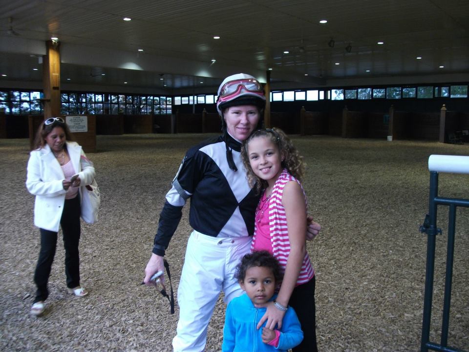 Janice L. Blake with fans after a winning race